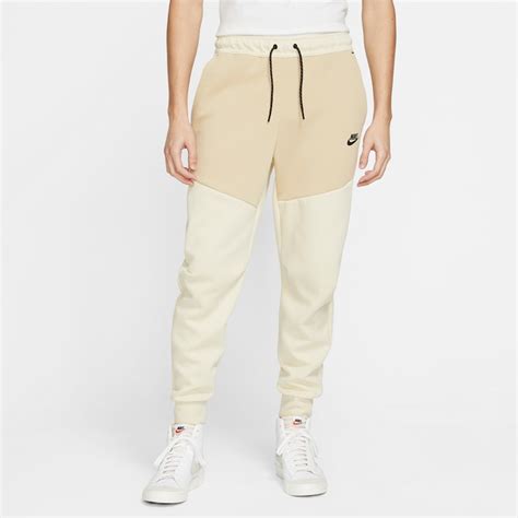 nike tech beige broek|gray Nike tech suit.